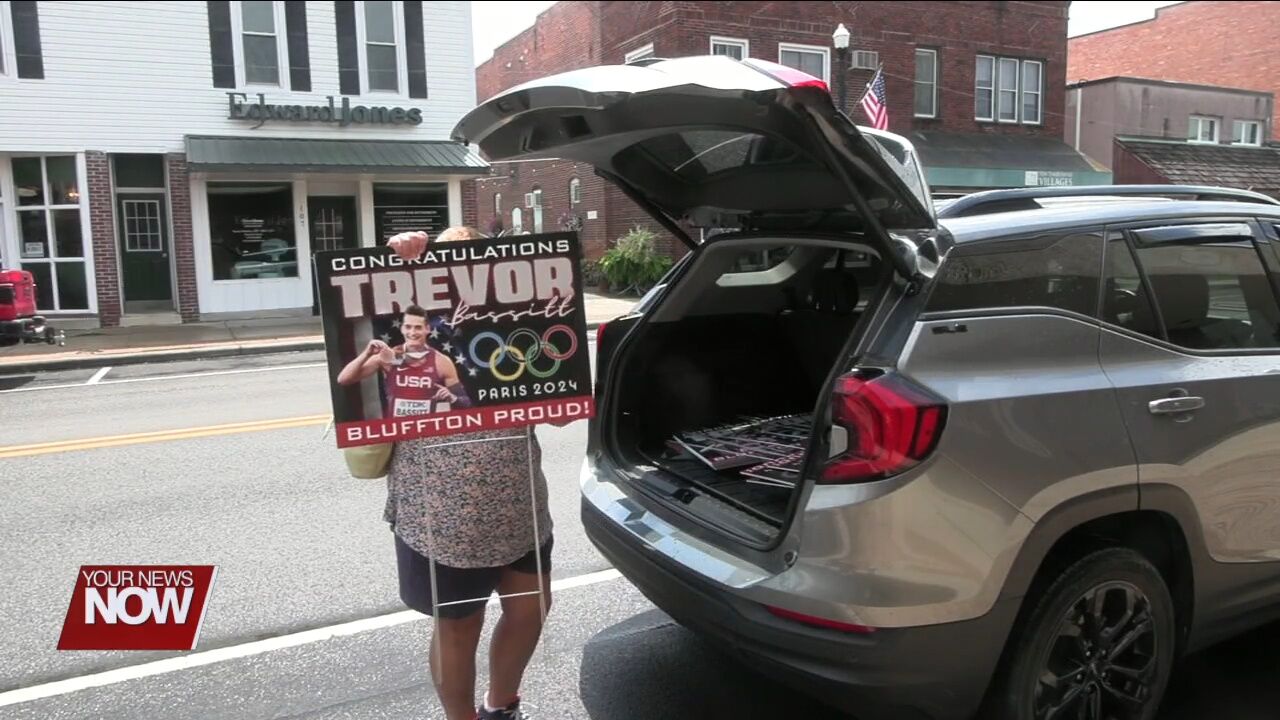 Two Bluffton women show local Olympian Trevor Bassitt support by covering community in signs